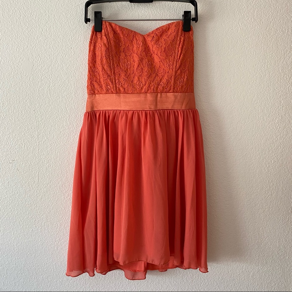 Nordstrom coral color dress with tie sash in back.